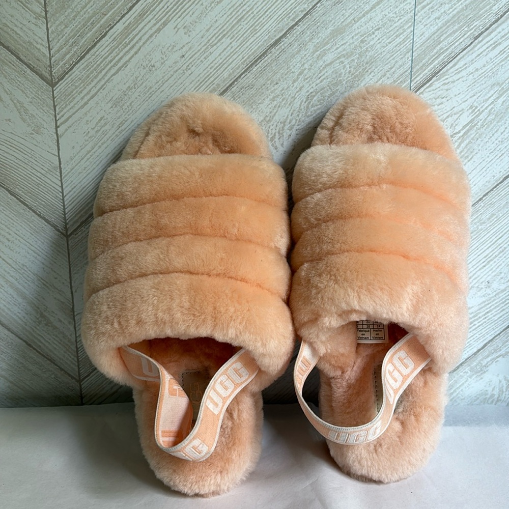 UGG pink platform fuzzy slipper US 7